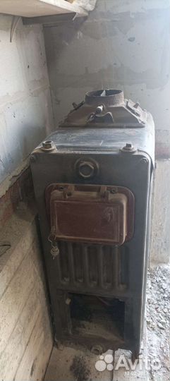 Котёл твердотопливный чугунный