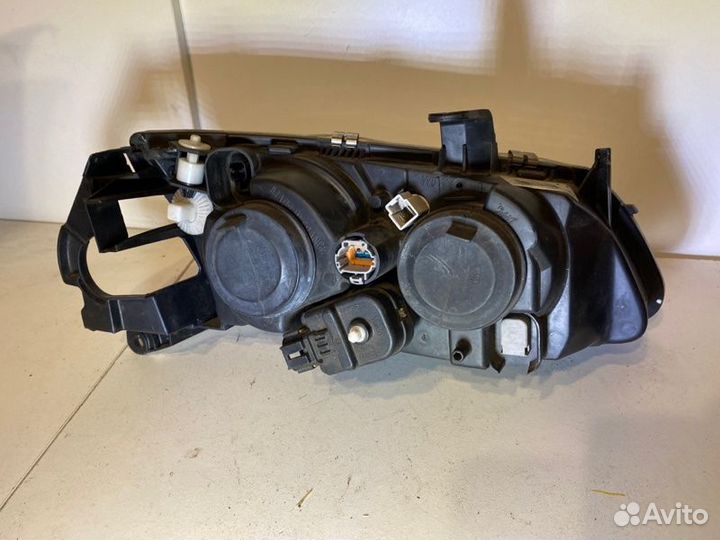 Фара галогеновая левая Nissan Almera N16 2000-2007