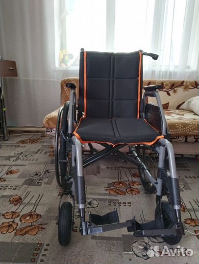Инвалидная коляска