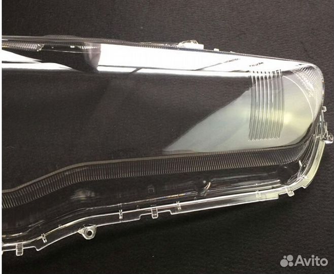 Стекло фары Mitsubishi Lancer X