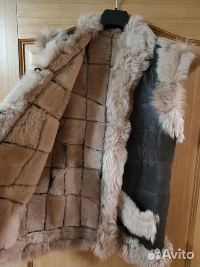 Меховая жилетка