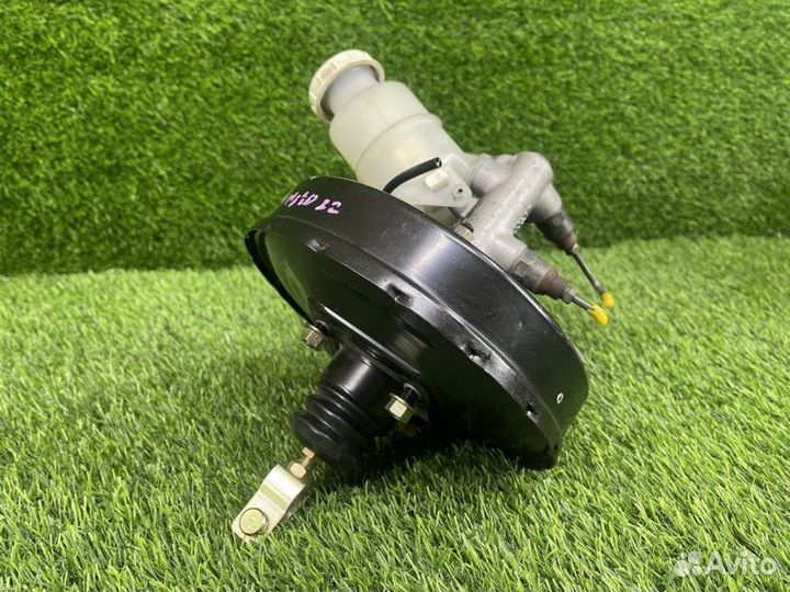 Вакуумный усилитель 90 т. км передний Mitsubishi