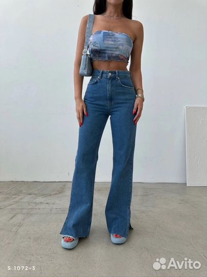 Джинсы женские широкие с разрезами по краям