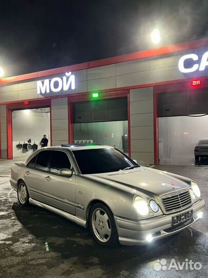 W210 E55 передний бампер обвес