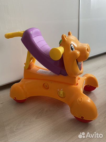 Игрушка бегемот-каталка толокар музыкальный