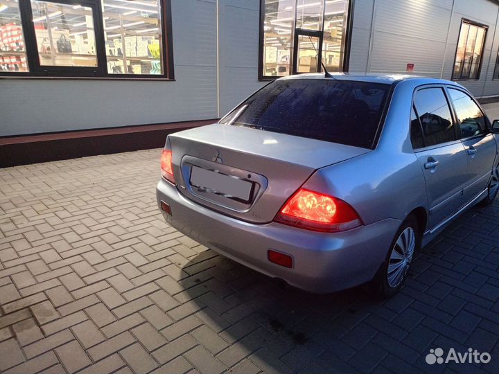 Mitsubishi Lancer 1.6 МТ, 2006, 307 000 км