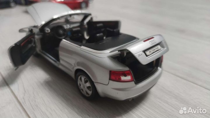 Модель машины Audi a4 1/18 welly