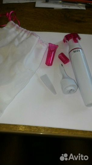 Триммер для удаления волос фирмы veet