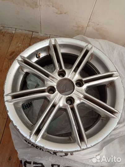 Литые диски r14 4x100 отверстие под ступицу 70.1