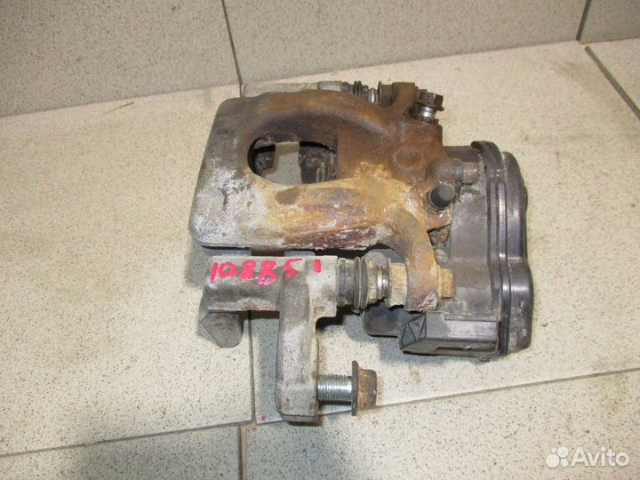 Суппорт задний правый Nissan Qashqai (J11)