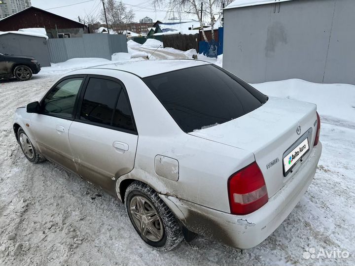 Mazda Familia 1.5 AT, 2001, 150 000 км