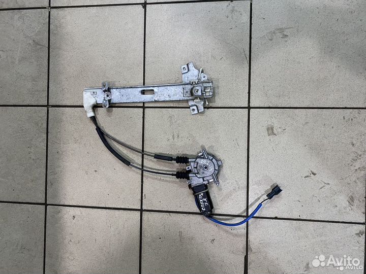 Стеклоподемник задний правый Kia Spectra