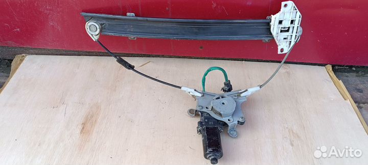 Стеклоподъемник левый передний Chevrolet Lanos 200