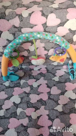 Дуга с игрушками