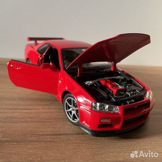 Модель Nissan Skyline GT-R R34 Welly 1:24