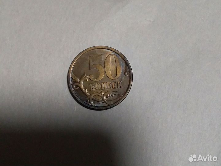 Монета