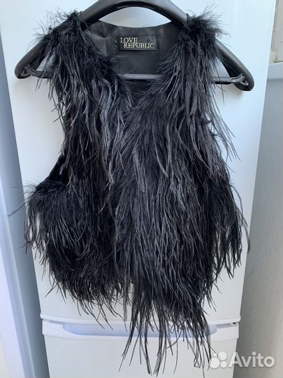 Жилет из перьев