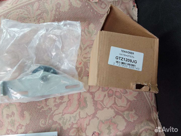 Натяжной ролик ремня генератора