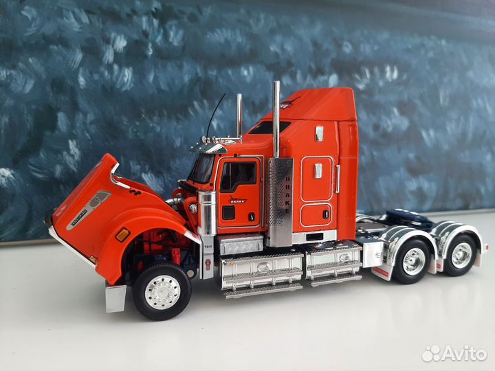 Kenworth T 909 orange AUS Drake