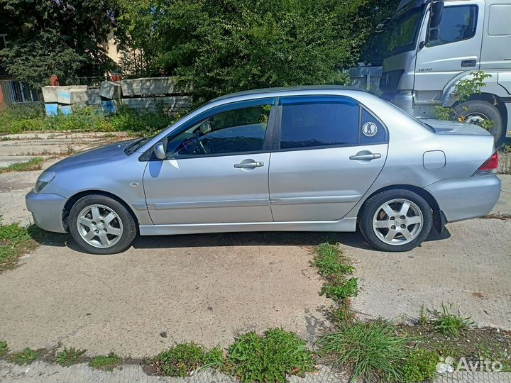 Разбор Митсубиси lancer 9 2006 ат