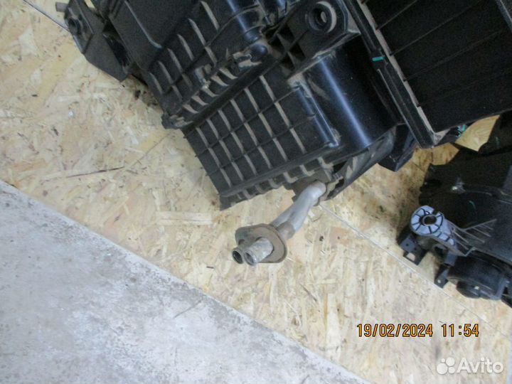 Радиатор печки Джили Эмгранд EC7