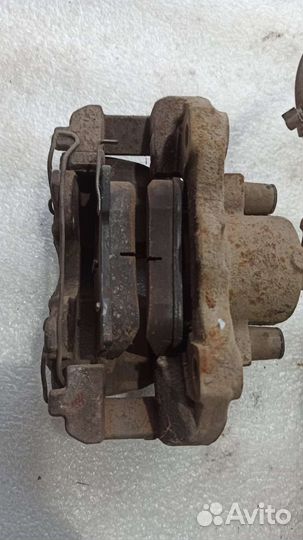 Суппорт тормозной передний Opel Astra H