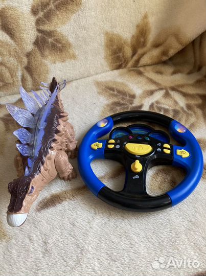 Игрушки Руль и динозавр