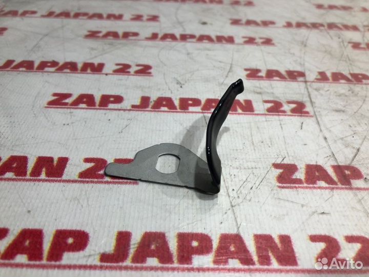 Пружина лючка бензобака Mazda