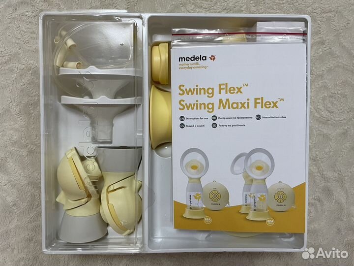 Молокоотсос medela swing maxi flex