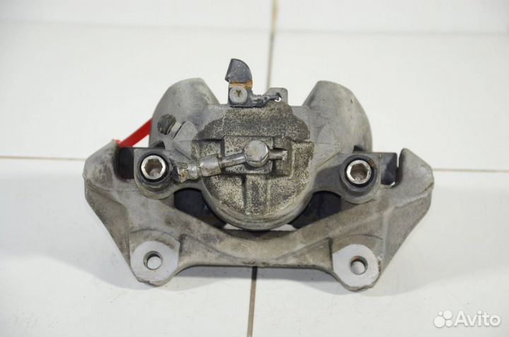 Суппорт тормозной передний левый Land Rover