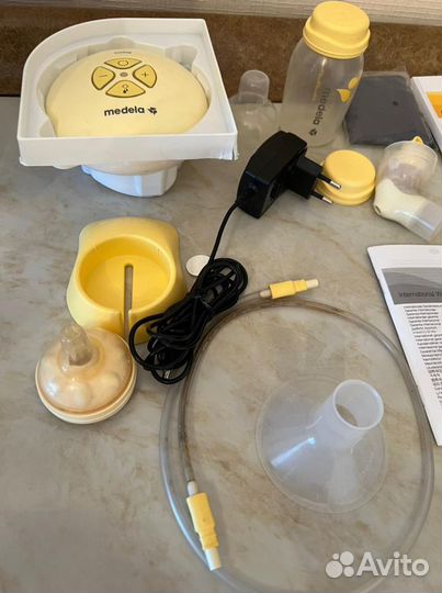 Молокоотсос medela