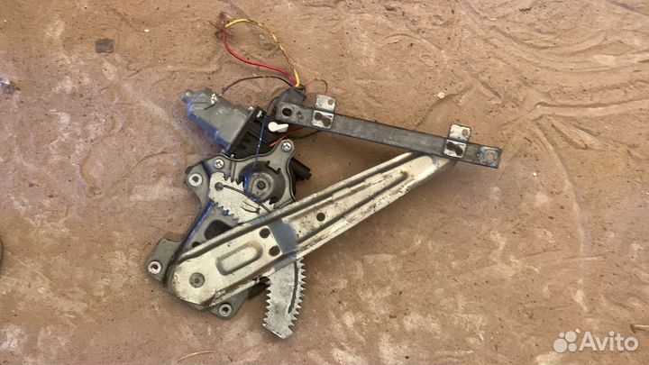 Стеклоподъемник с моторчиком задний лев Лансер 9