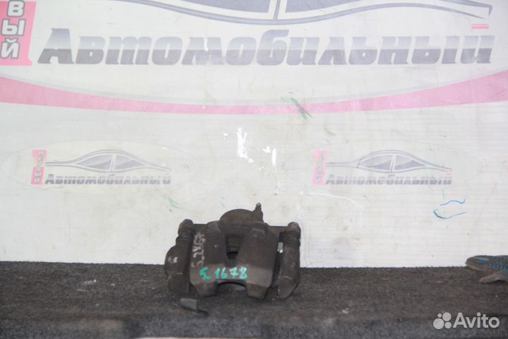 Суппорт перед лево c Toyota Vitz SCP10 1SZ-FE