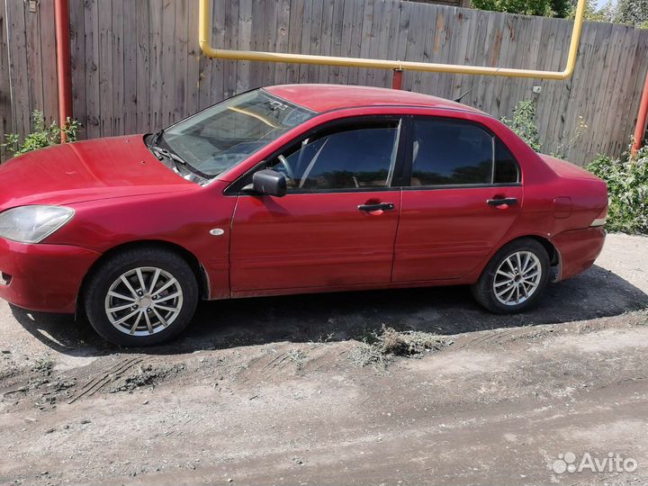 Mitsubishi Lancer 1.3 МТ, 2006, 200 000 км