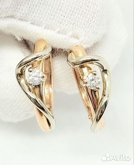 Золотые серьги с бриллиантом