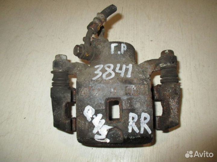 Суппорт задний правый Infiniti Q45 Nissan Cima