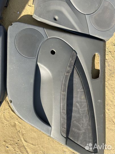 Шевроле Лачети обшивки дверей