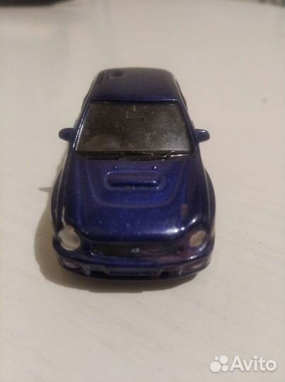 Subaru Impreza WRX модель 1:64