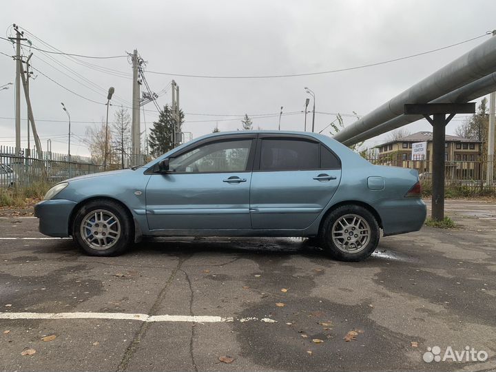 Mitsubishi Lancer 1.3 МТ, 2006, 402 610 км