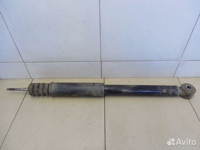 Амортизатор задний Almera (G15) 2013