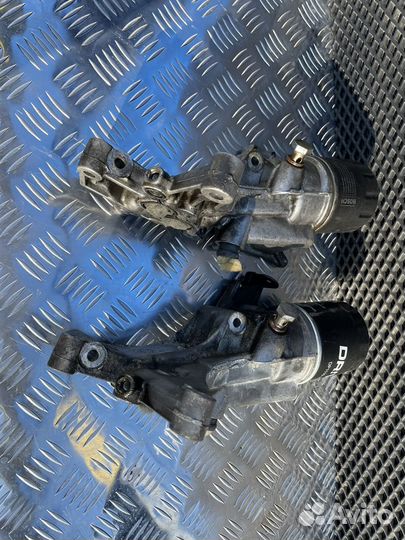 Кронштейн масляного фильтра 03F903143H