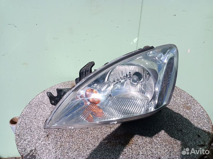 Фара левая для Митцубиси Лансер Mitsubishi Lancer