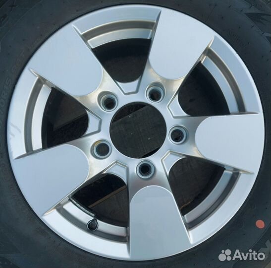 Нива Зима шипы R15 205/70 Hankook 5x139.7 Skad