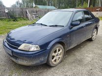 Ford Laser 1.5 AT, 2001, 302 000 км, с пробегом, цена 140 000 руб.