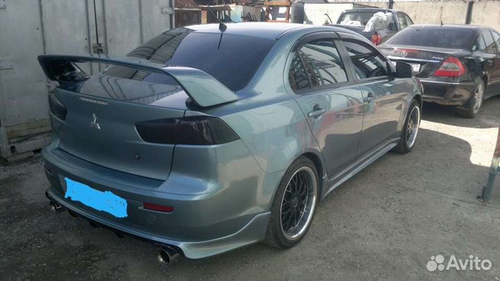 Накладка заднего бампера Lancer X (Зодиак)