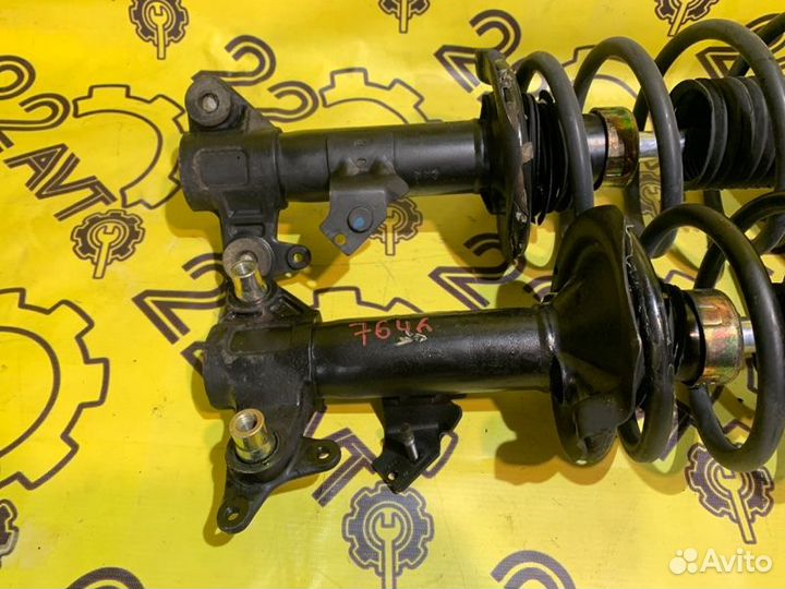 Стойки комплект передние Nissan Primera TP12