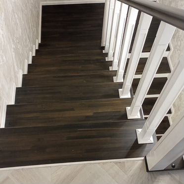 Обшивка бетонной лестницы деревом под ключ