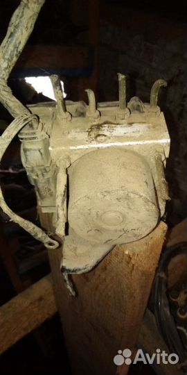 Блок ABS Nissan Tiida C11