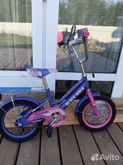 Четырех колёсный велосипед