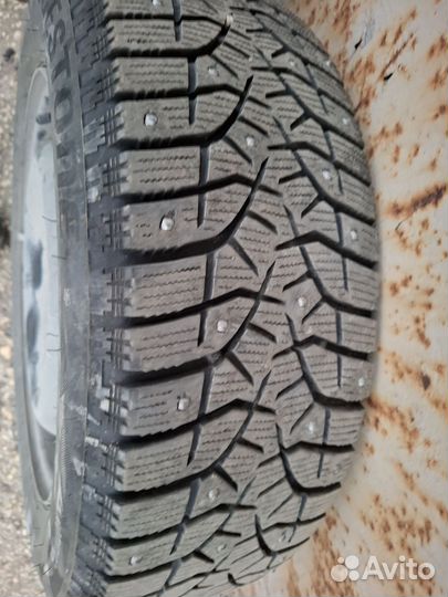 18565 r15 зимняя резина шипованная Бриджстоун